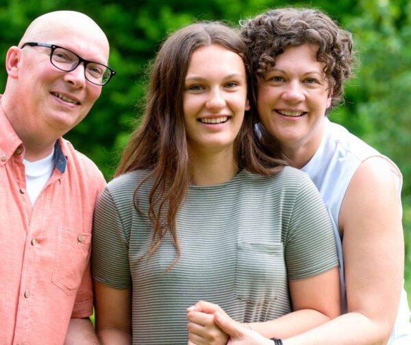 teen daughter with parents