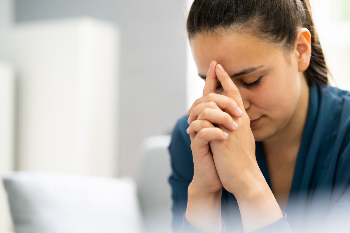 deeper intimacy with God showing woman in prayer