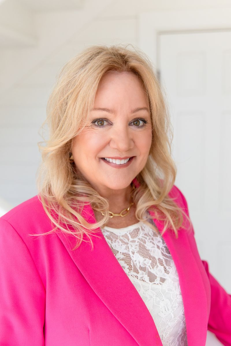 laine lawson craft pink suit headshot