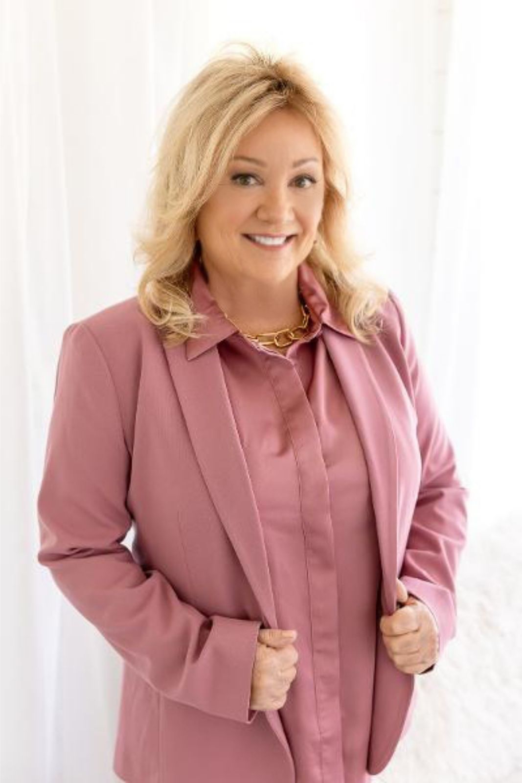 laine in pink suite for press kit page